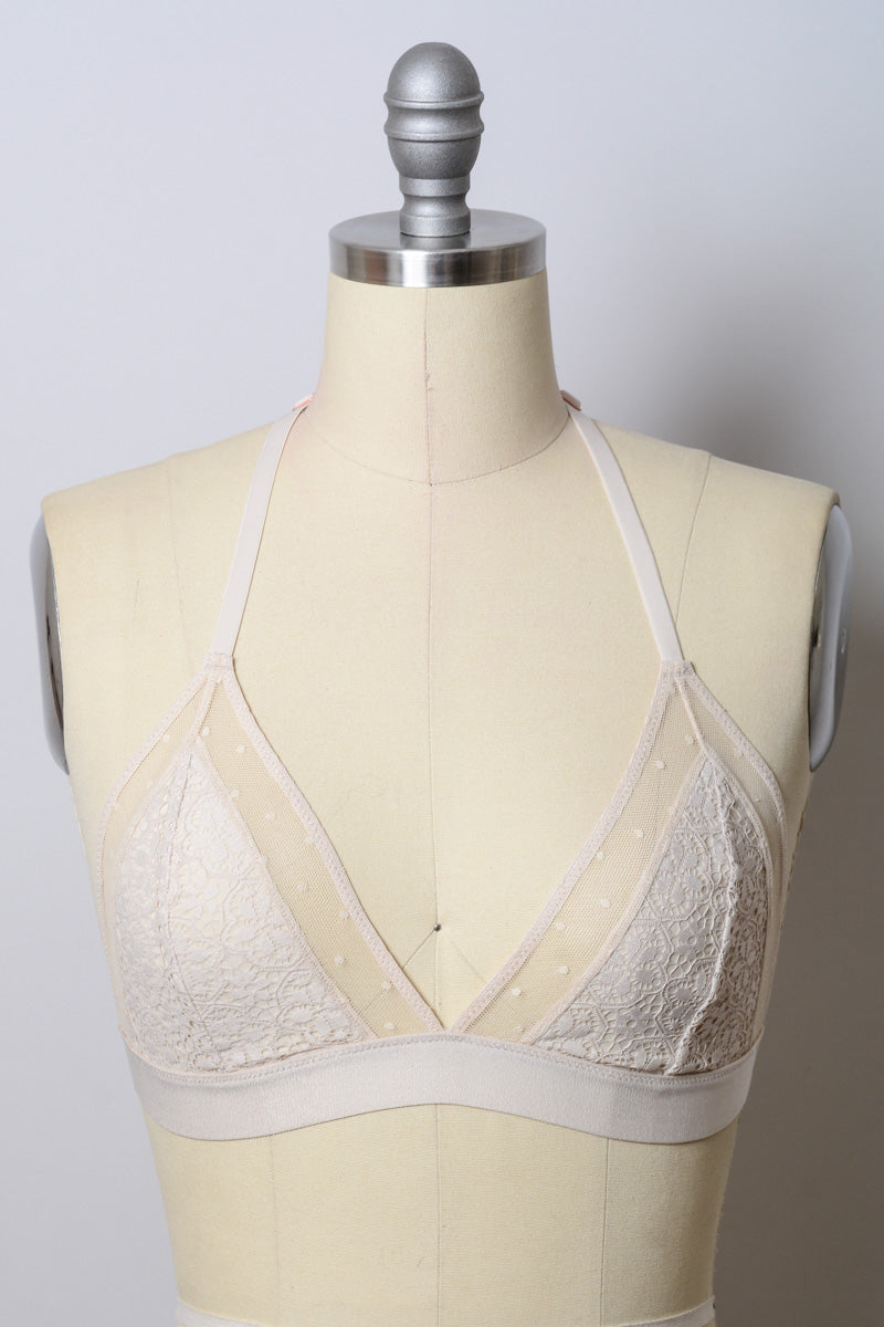 Natural crochet T-back bralette by Leto Collection featuring soft, intricate crochet design and adjustable straps.