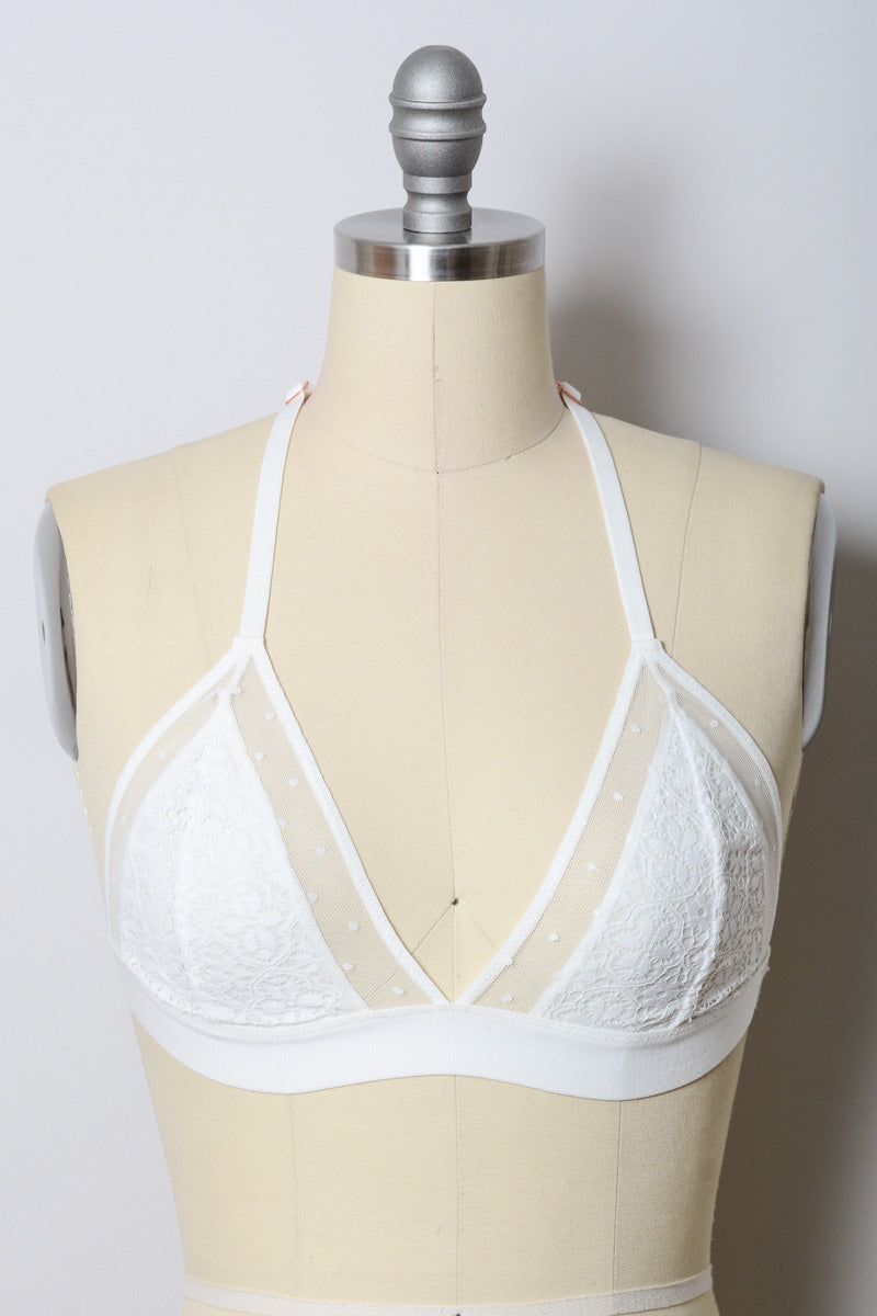 White crochet T-back bralette by Leto Collection, featuring intricate crochet details and a comfortable T-back design.